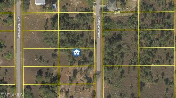 Aerial view of property's location featuring property parcel outlined