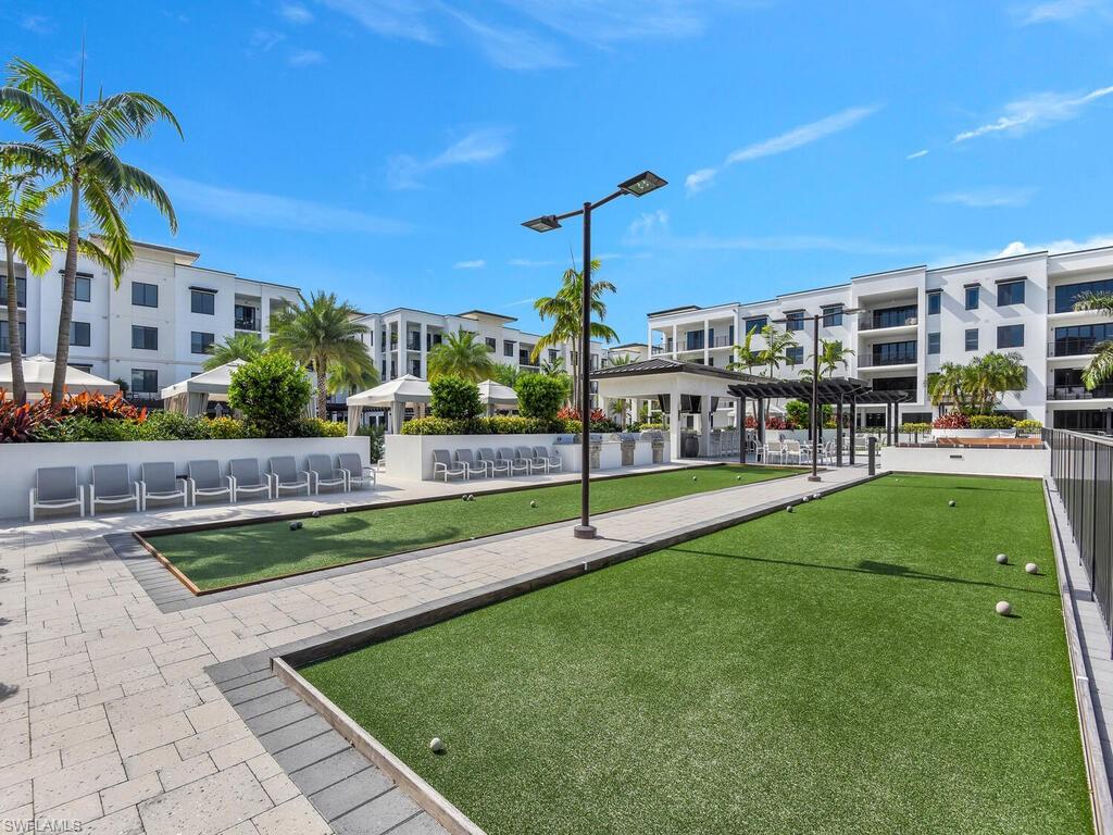 View of home's community featuring a bocce ball area