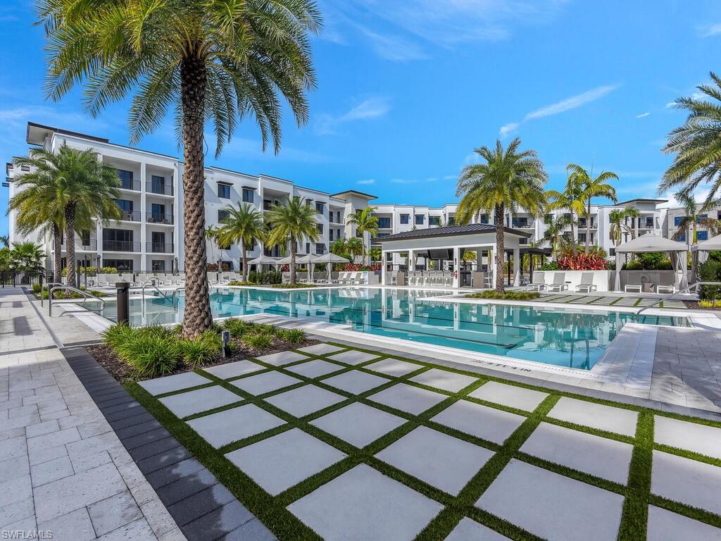 Community pool featuring a gazebo and a patio