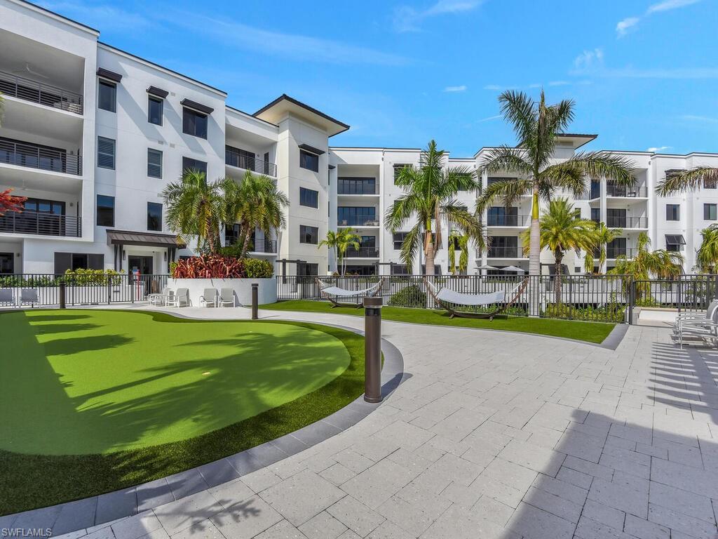 View of property's community featuring a putting area