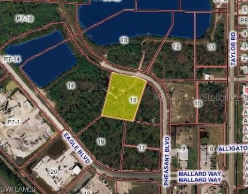 Aerial map of property and surrounding area featuring property parcel outlined
