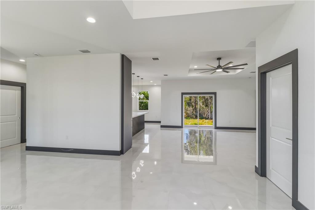 Spare room featuring recessed lighting and a ceiling fan