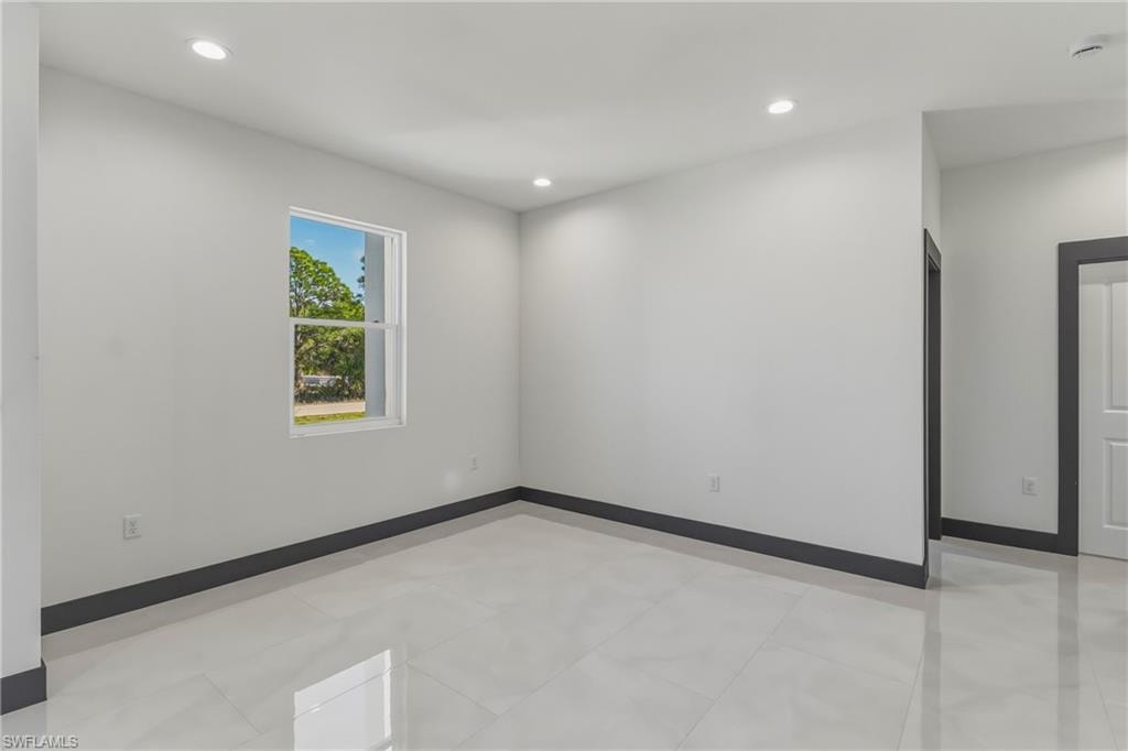 Spare room with recessed lighting
