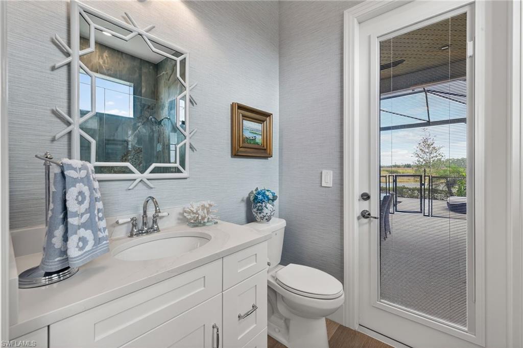 Bathroom with vanity and dark wood finished floors