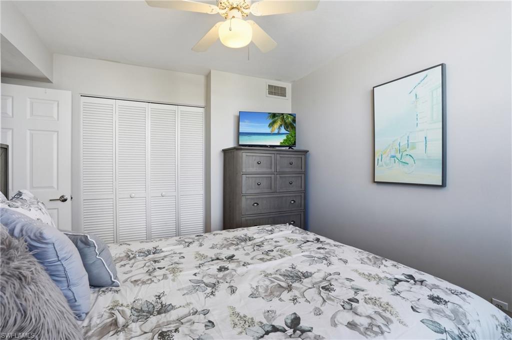 Bedroom featuring a closet and a ceiling fan