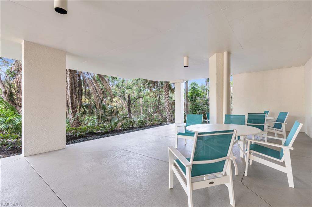 View of patio with outdoor dining area