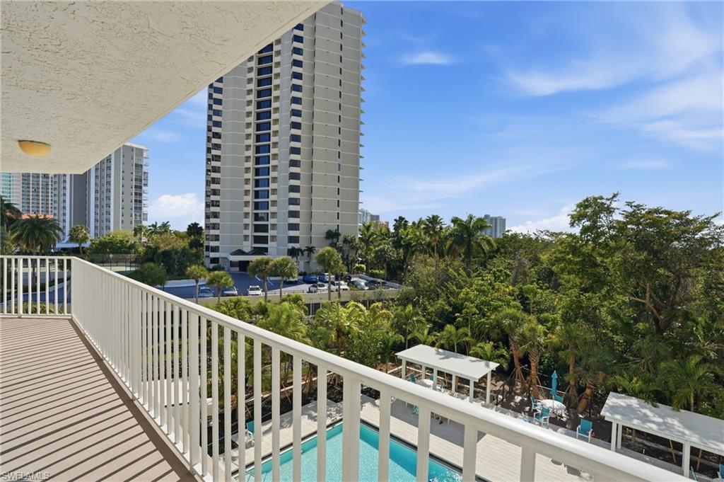 Balcony with view of pool