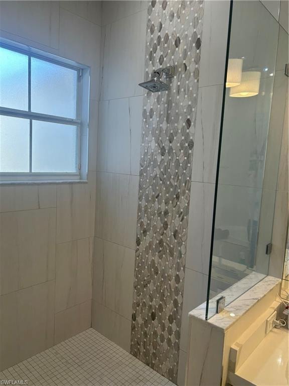 Primary bathroom with a stall shower and vanity