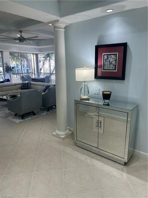 Hall with decorative columns and recessed lighting