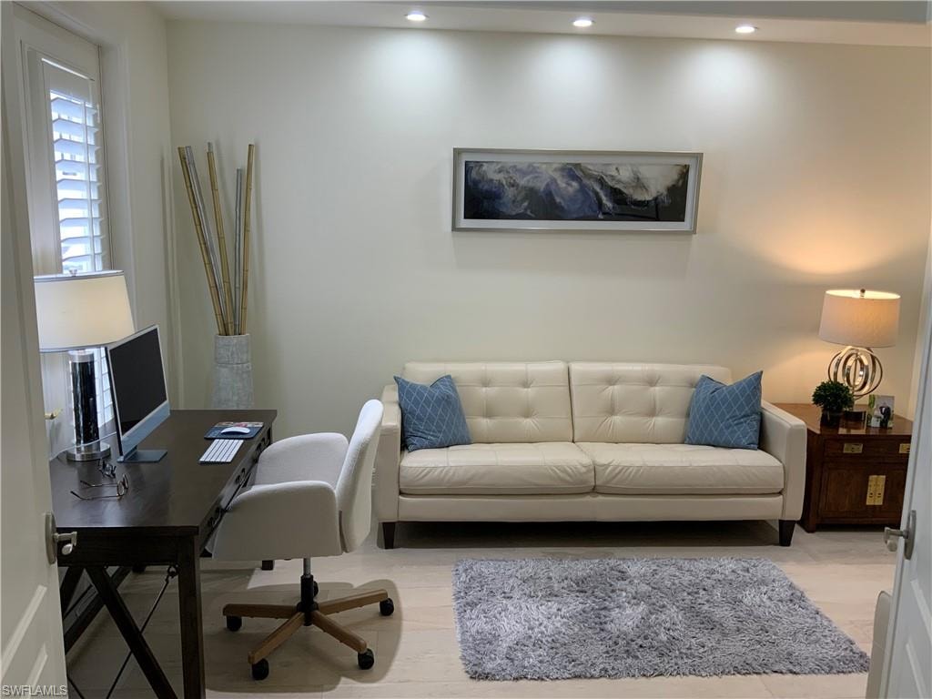 Office area with wood finished floors