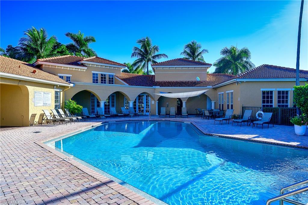 Community pool featuring a patio area