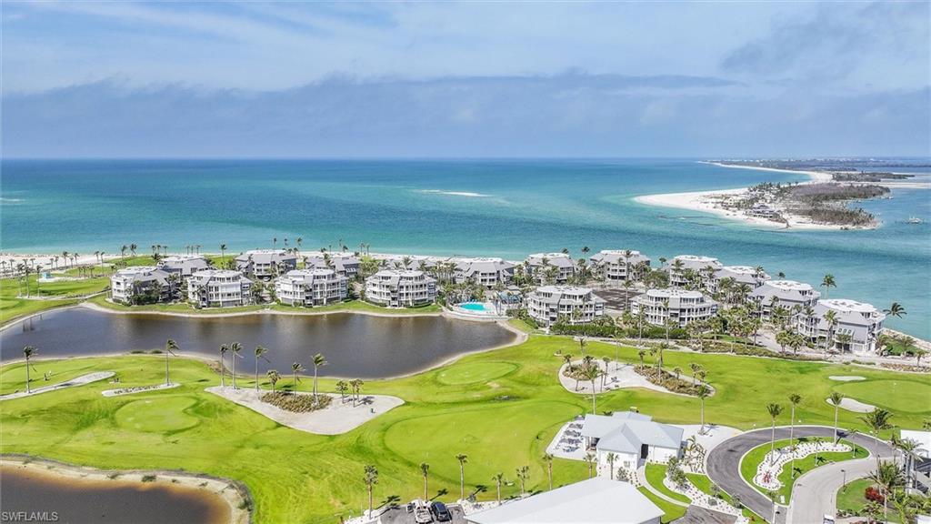Bird's eye view of a nearby body of water and a golf club