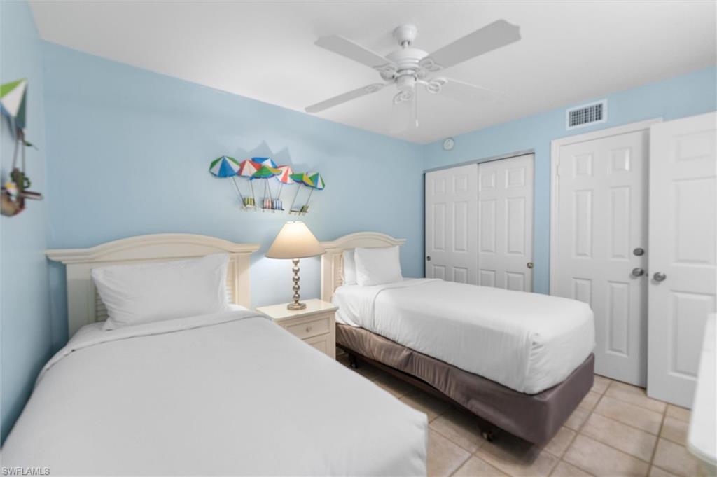Bedroom featuring ceiling fan and light tile patterned floors