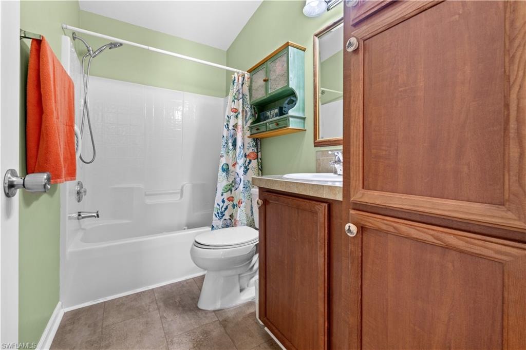 Full bathroom featuring vanity and shower / tub combo
