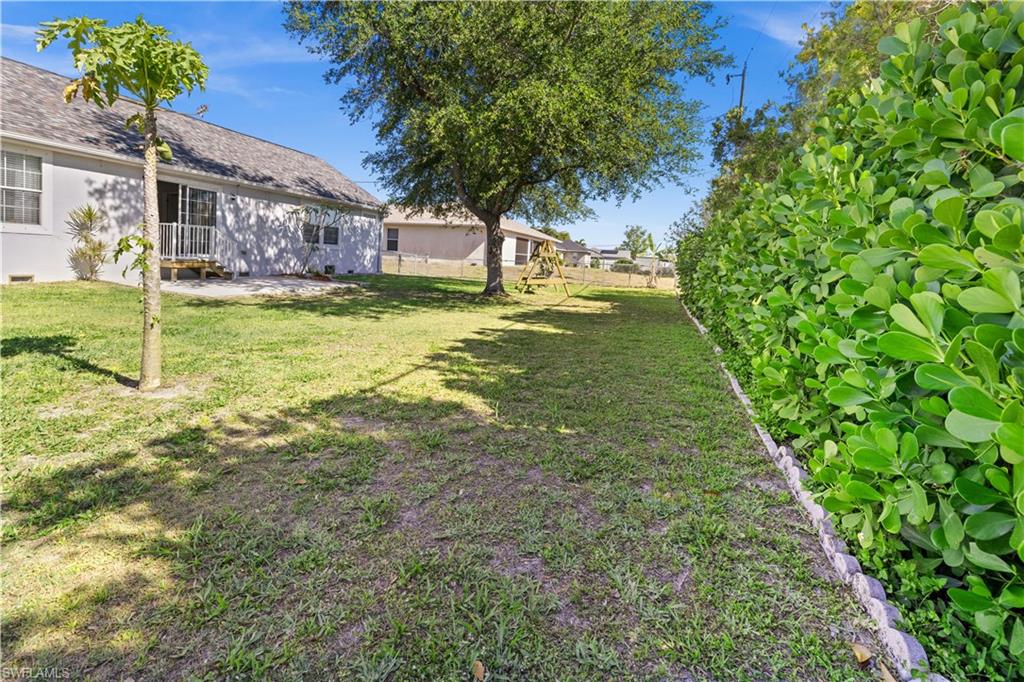 Fenced yard featuring a patio area