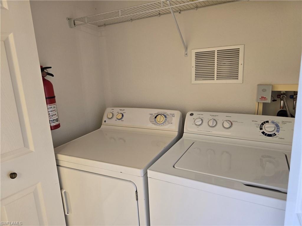 Laundry area featuring washing machine and dryer