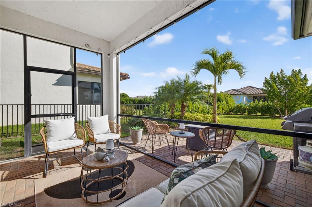 Sunroom featuring an outdoor living space