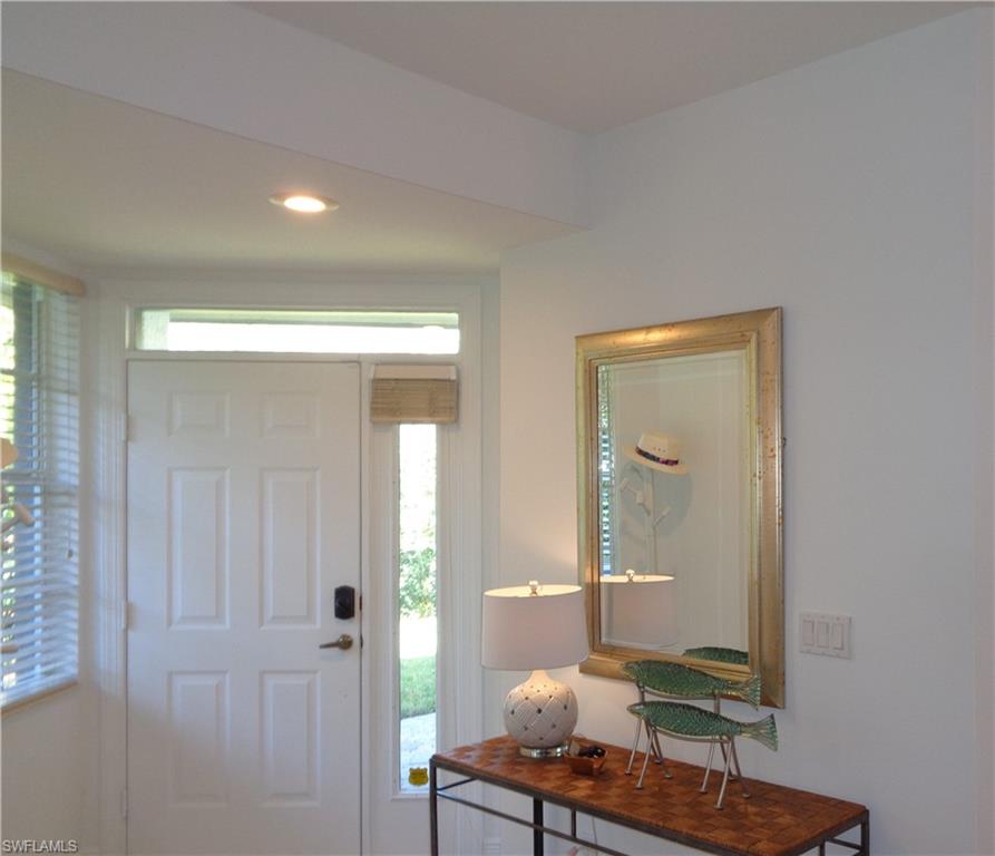 Foyer entrance featuring recessed lighting