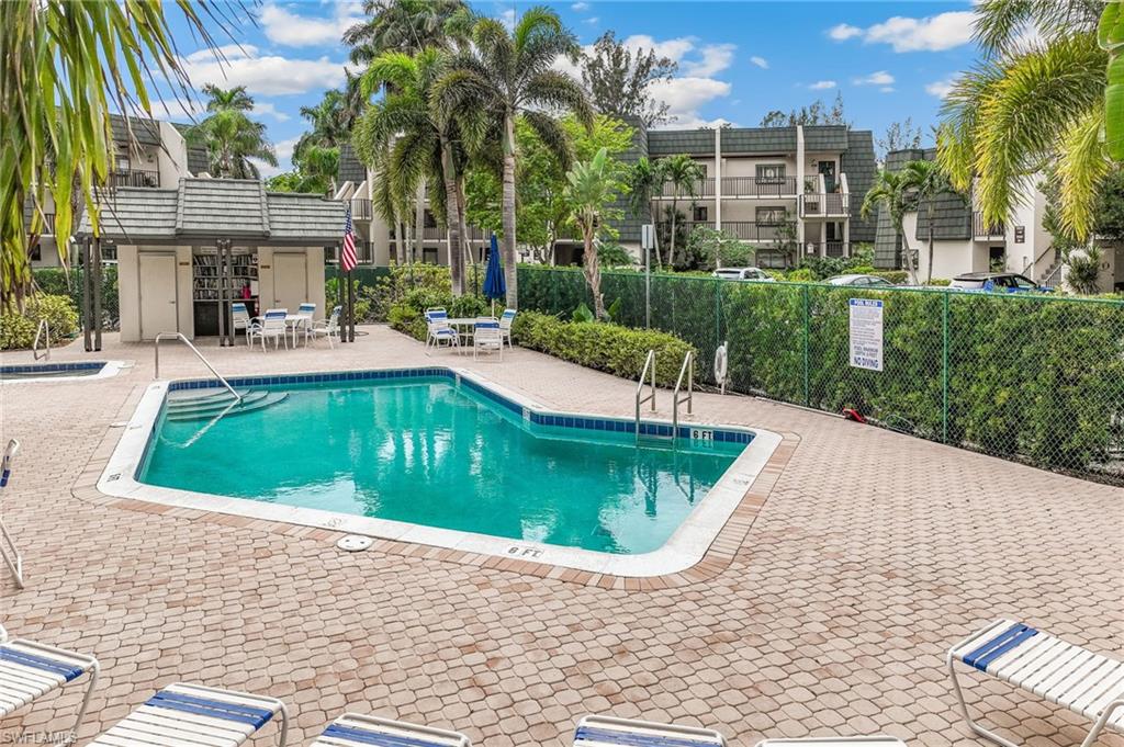 Pool with large deck, rest rooms