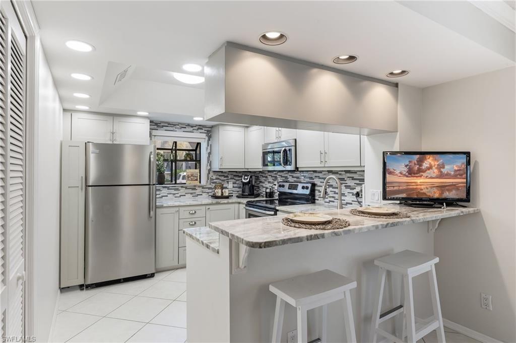 Open kitchen with breakfast bar
