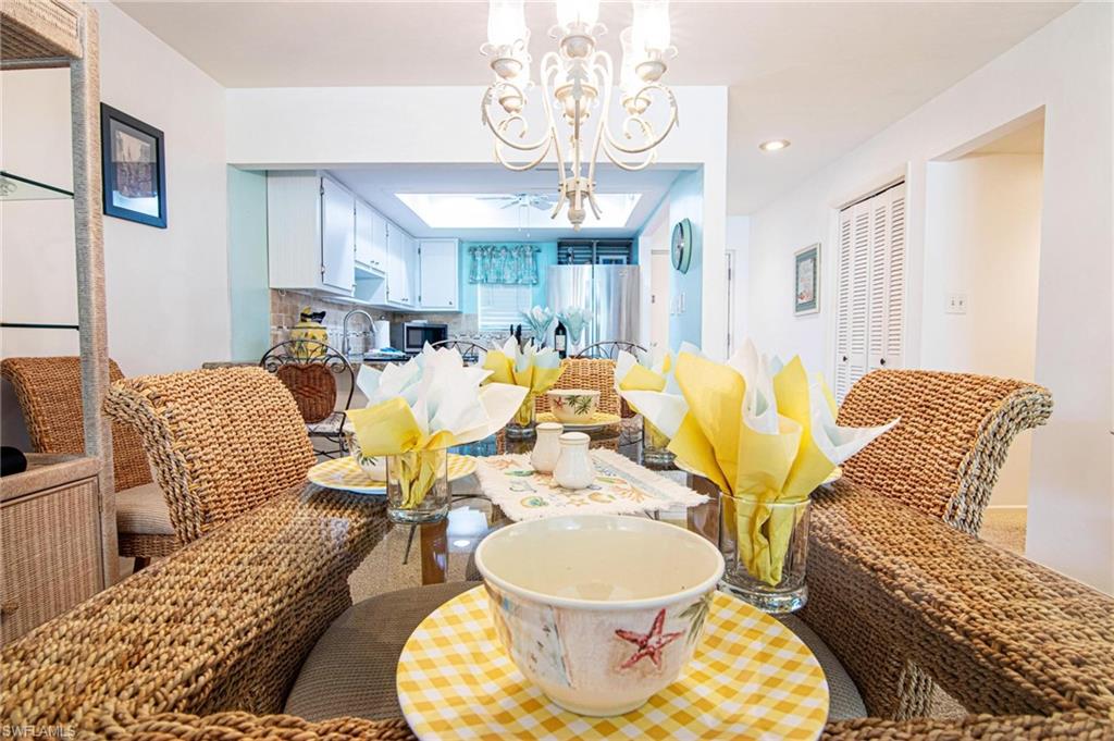 Dining space featuring hanging lights
