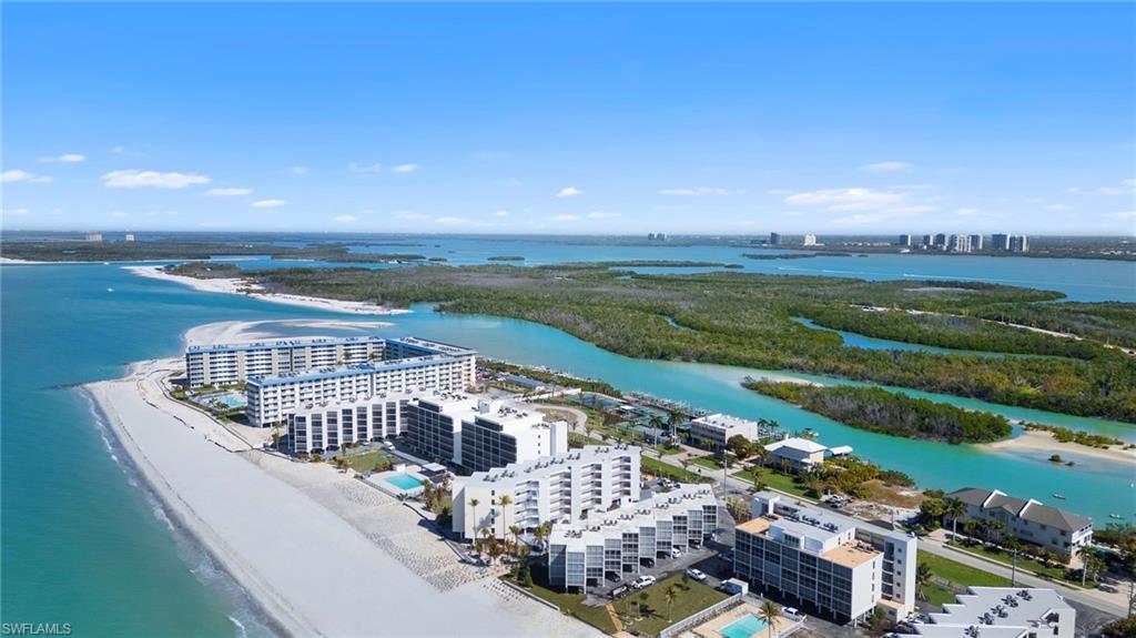 View of urban area with expansive beach