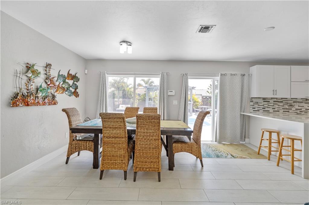 Dining area with healthy amount of natural light
