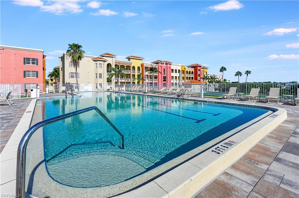 Community pool featuring a patio area