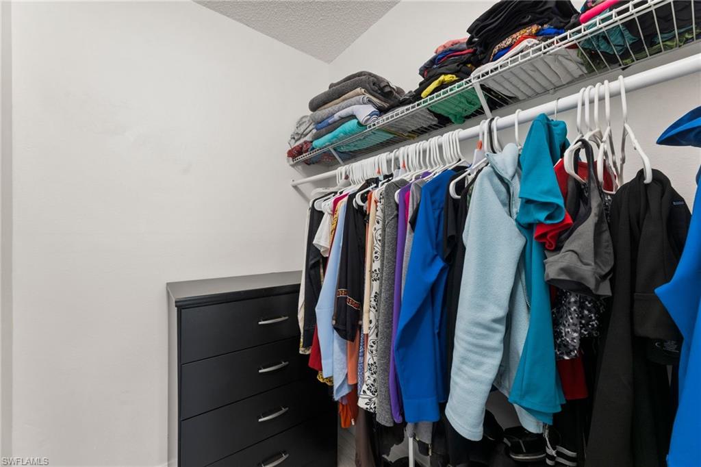 View of walk in closet in second bedroom