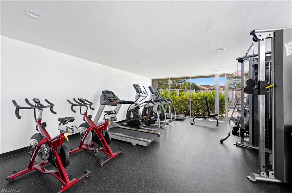 Workout area with floor to ceiling windows