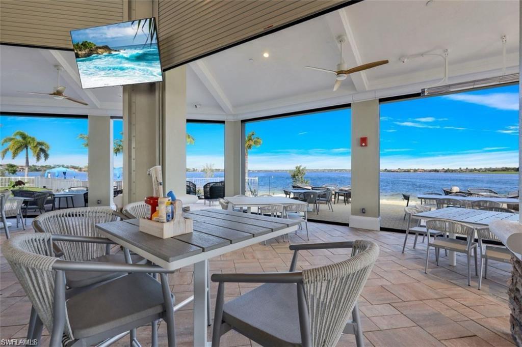 View of patio featuring ceiling fan and outdoor dining space