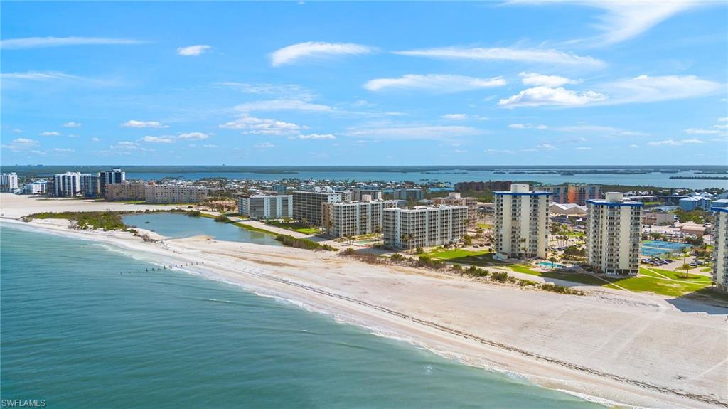 View of urban area with waterfront with a beach