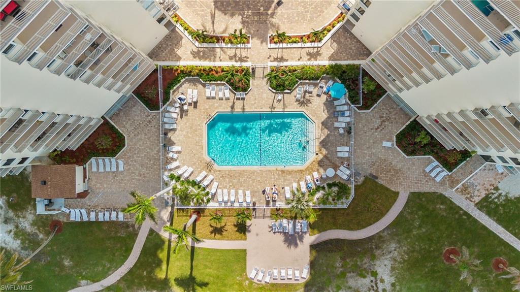 Community pool with a patio