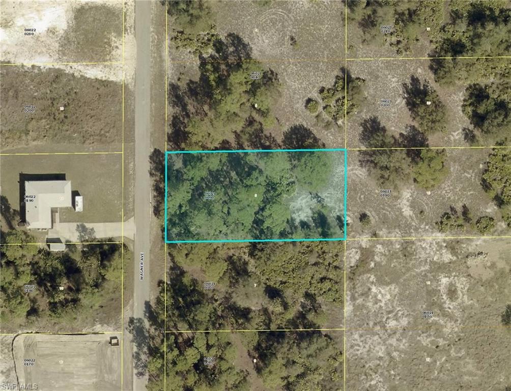 Aerial overview of property's location featuring property parcel outlined