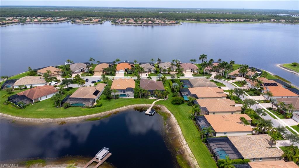 Aerial view of residential area with a nearby body of water