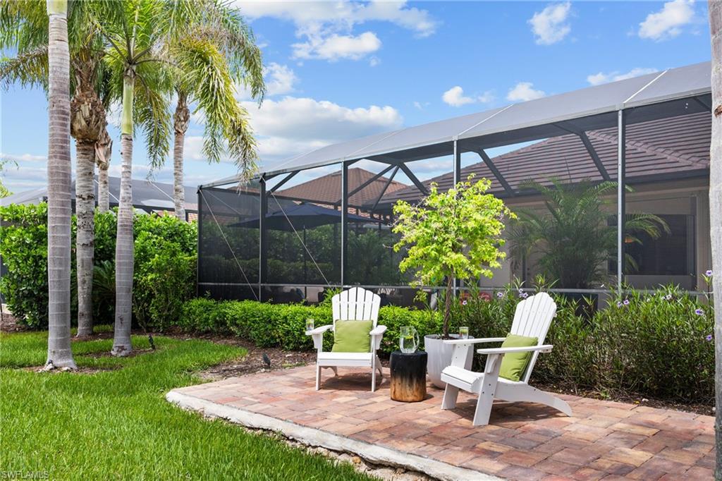 View of patio / terrace with a sunroom and a lanai