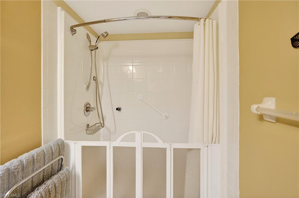 Bathroom featuring a shower stall