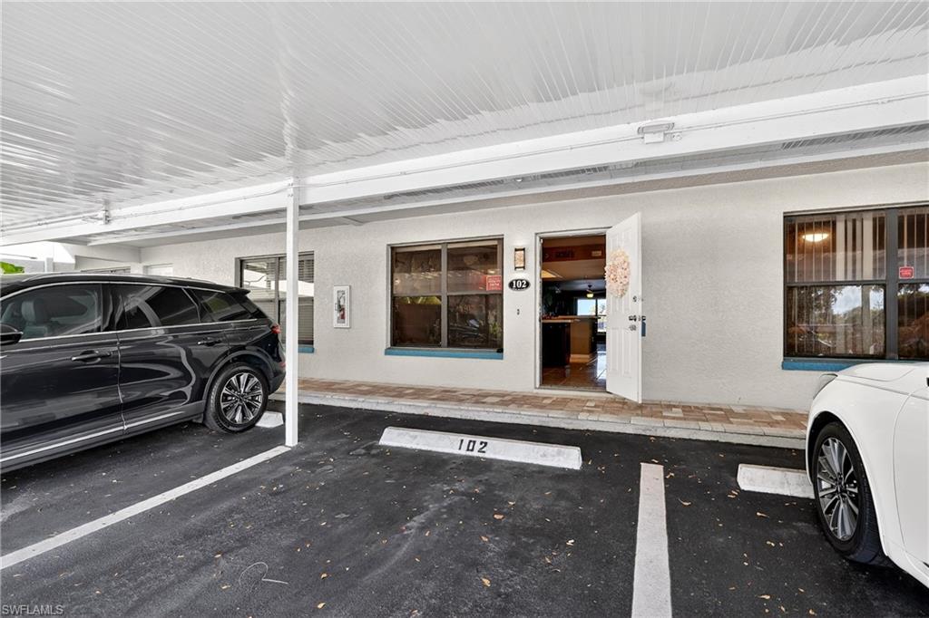 Garage featuring parking