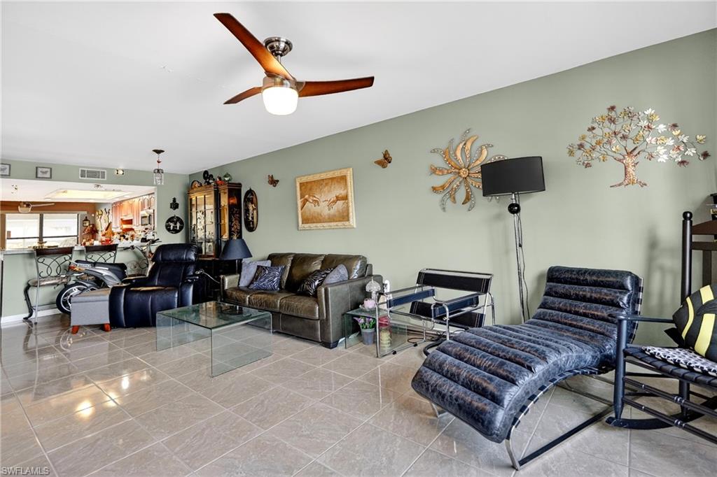 Living area featuring ceiling fan