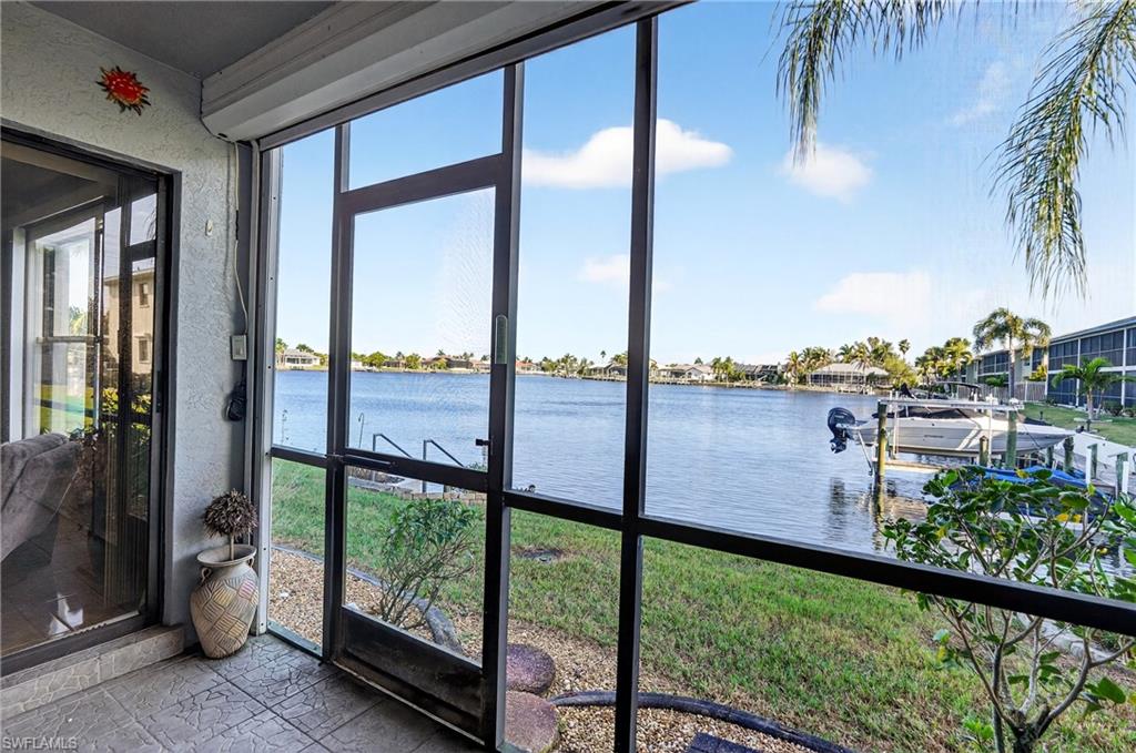 Water view with a dock