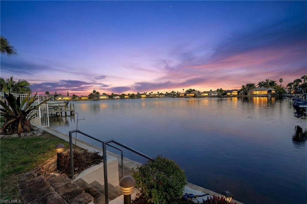 Water view with a dock