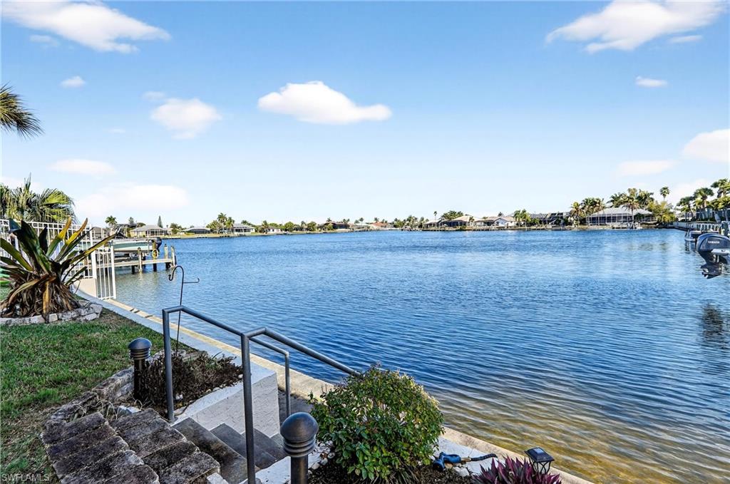 Water view with a boat dock