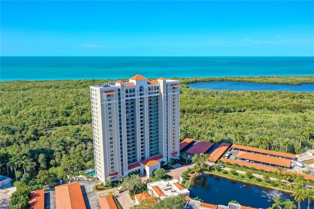 Bird's eye view of a large body of water and a heavily wooded area