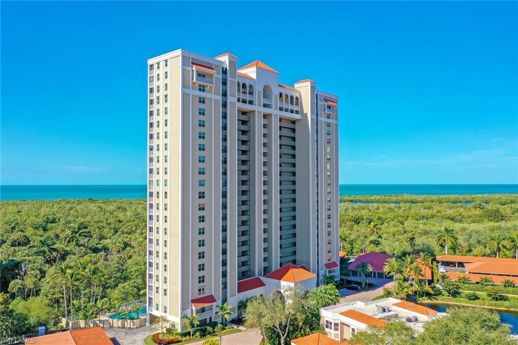 View of apartment building / complex with a water view