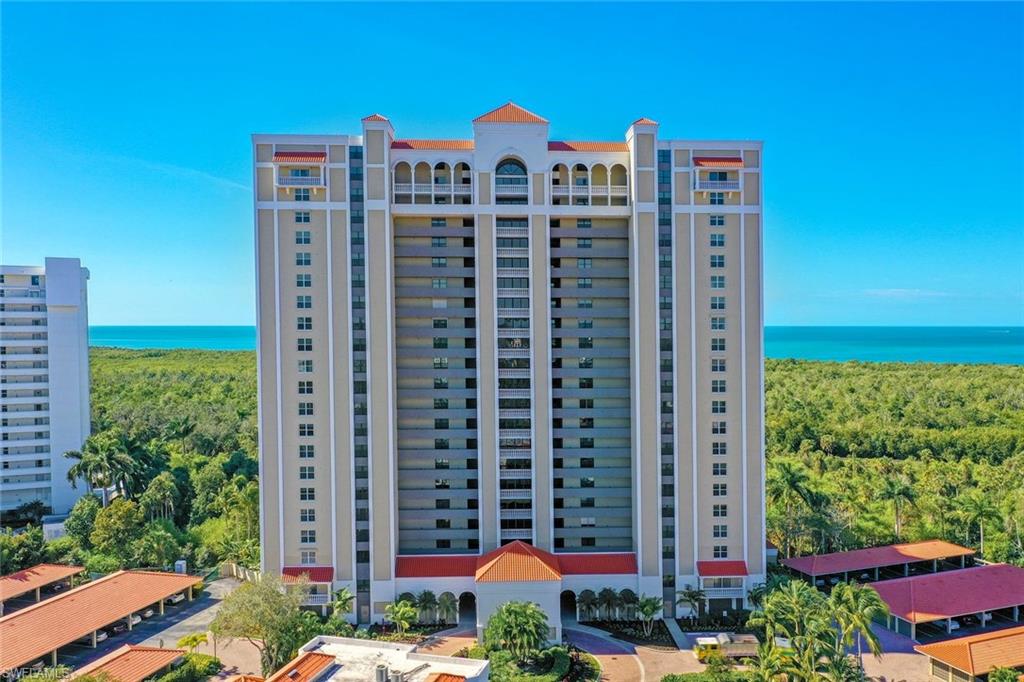 View of apartment building / complex with a water view