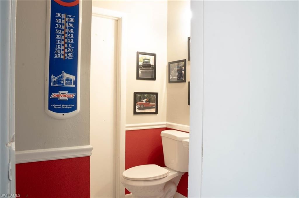 Main floor of garage full bath and walk in shower