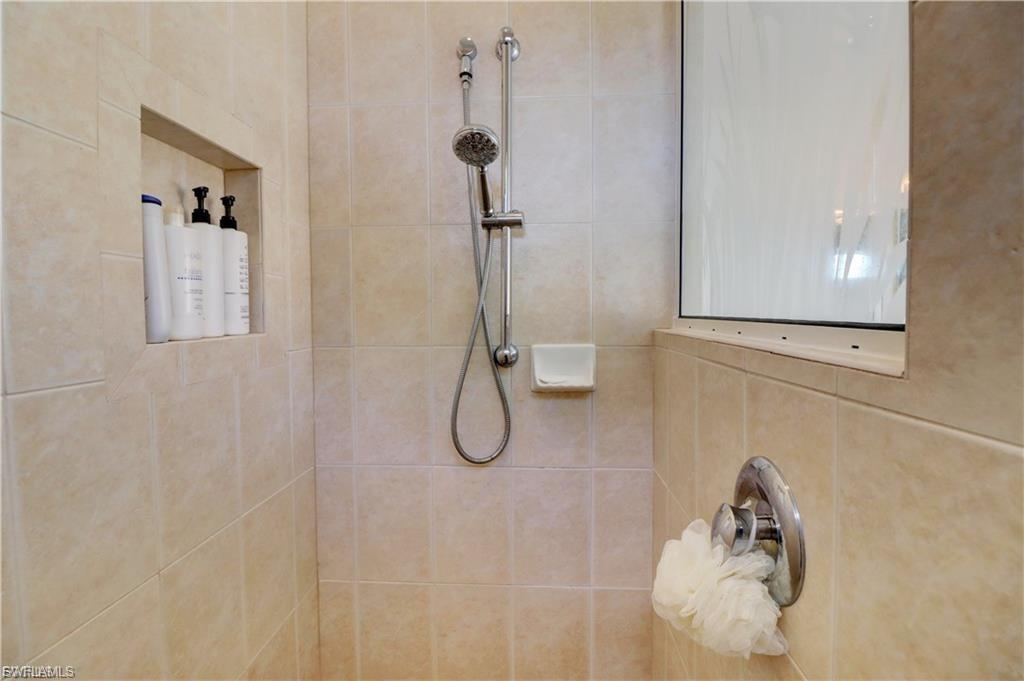 Bathroom featuring tiled shower