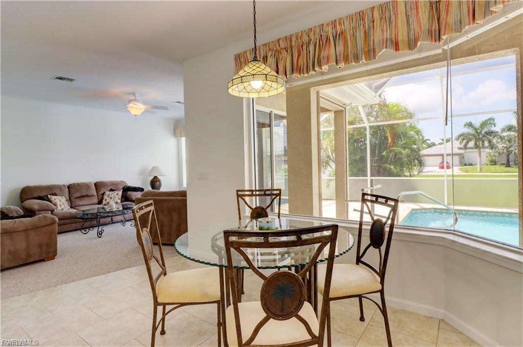 Dining space with ceiling fan