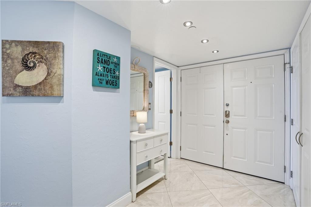 Foyer with recessed lighting and baseboards - Virtually Edited Image