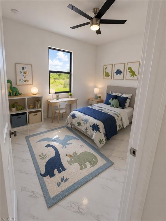 Interior room featuring light-toned walls and wood-finish flooring